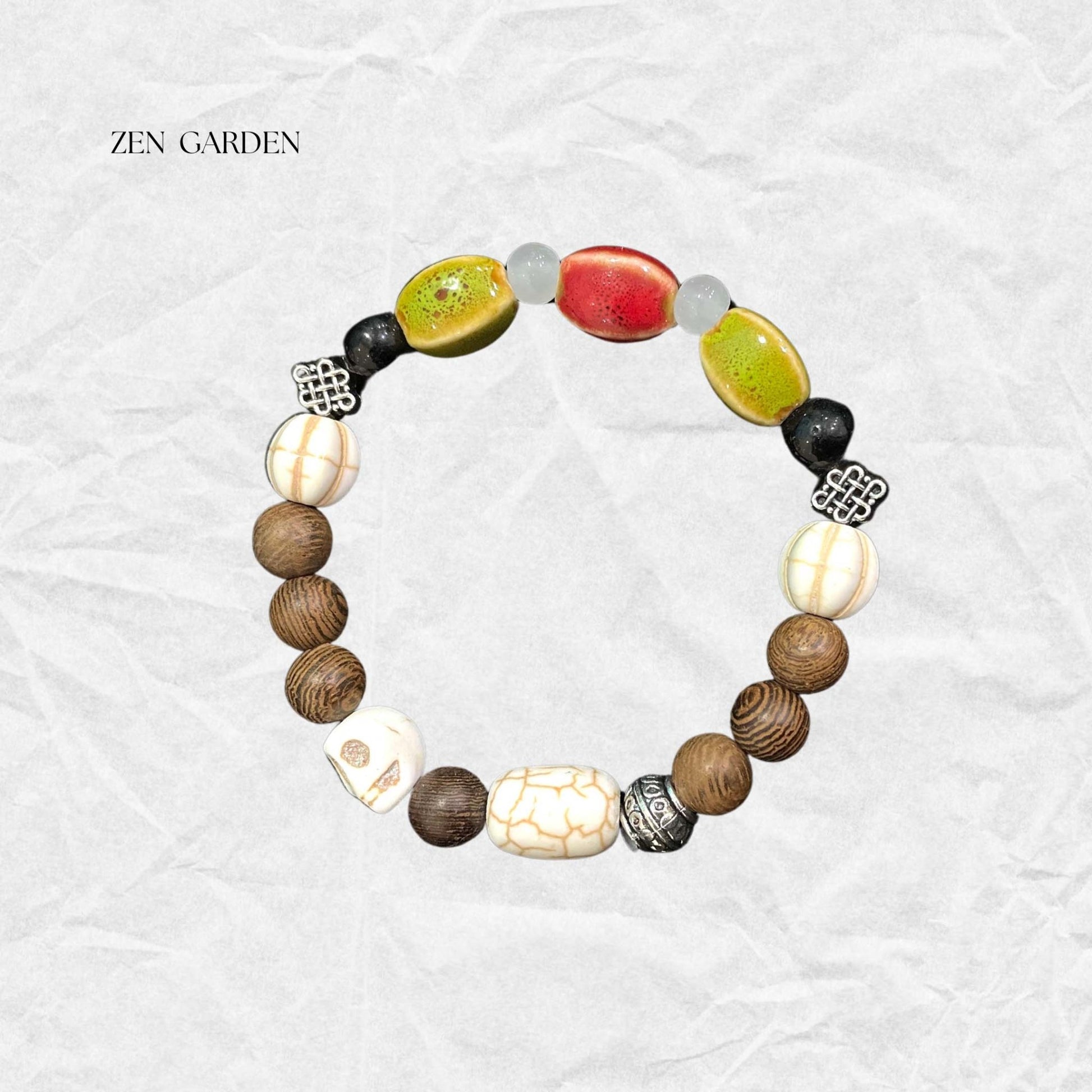 Zen-inspired beaded bracelet with colorful ceramic beads, wooden accents, and silver infinity knot charm, perfect for mindfulness and balance.